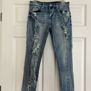 Blank NYC Blue Skinny Jeans with Distressed Details